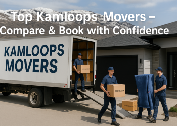 Professional movers loading a truck in Kamloops with scenic Thompson Valley hills in the background