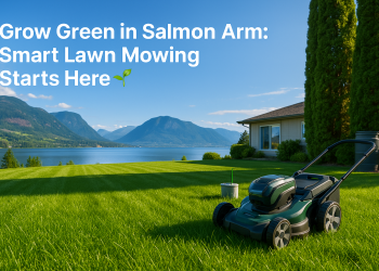 Freshly cut lawn in Salmon Arm, BC, bordered by lake views and mountain peaks, illustrating expert lawn care in the extended growing season of the Shuswap region.