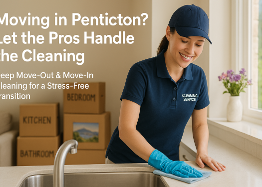 Professional cleaner wiping a countertop in a sunny Penticton home, moving boxes stacked neatly in the background.